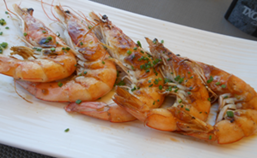 Grote garnalen met knoflook en peterselie