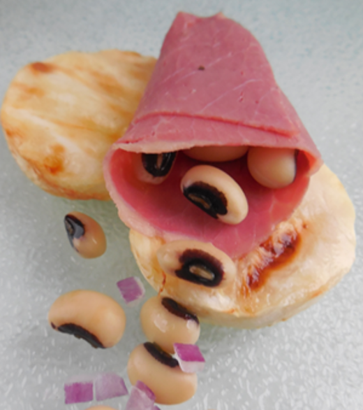 Gegrilde knolselderij runderham en oogbonen